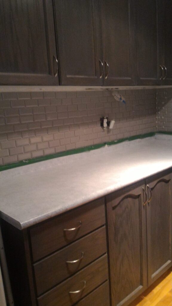 8 Low Cost Upgrades For The Winter, Backsplash, Lighting and Valence
