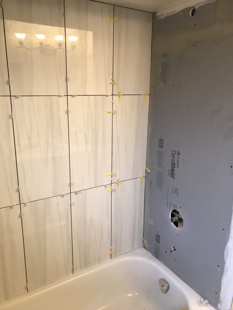 Budget DIY Shower Renovation – Upgrading to Porcelain Tile