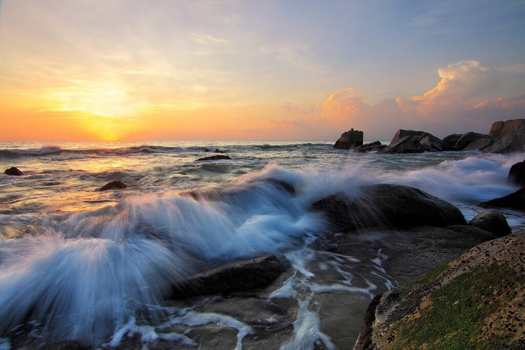 waves, rocks, sunset-1641793.jpg